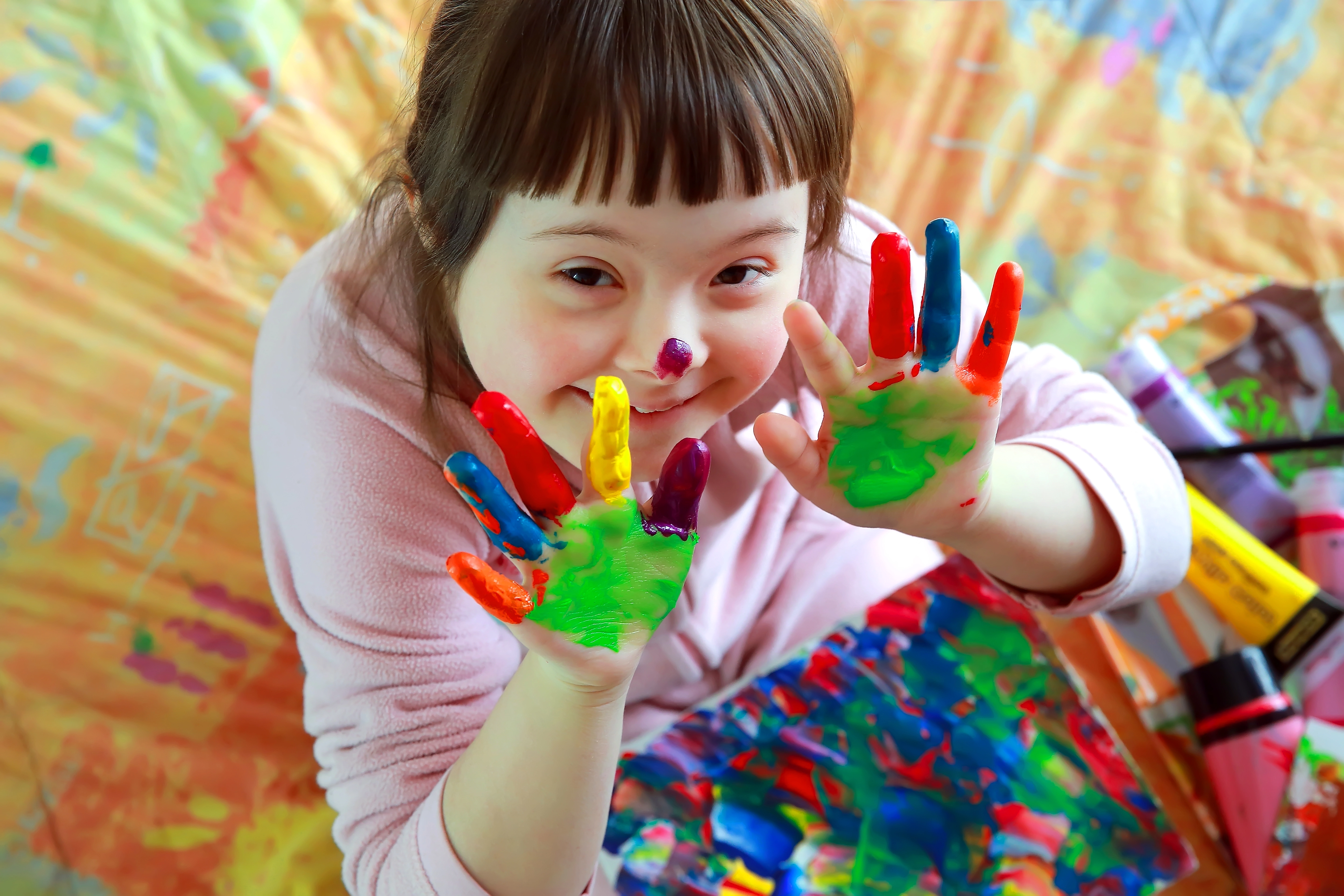 Child with painted hands